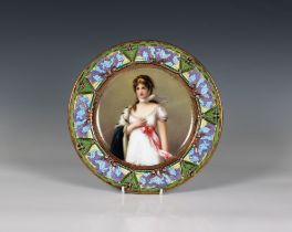 A Vienna style cabinet plate having transfer printed figure of a maiden, and elaborate art nouveau