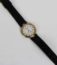 A Raymond Weil Geneve gold plated quartz watch black leather strap, with guarantee in original