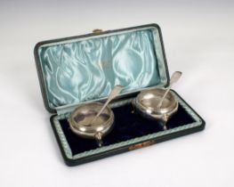 A pair of cased silver caldron salts William Aitken, Birmingham, 1902, 2½in. (6.3cm.) diameter,