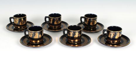 A set of six coffee cans and saucers stamped 'ST hand made in Greece 24k Gold', decorated with