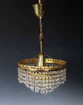 A brass & glass chandelier 10in. (25.4cm.) diameter, together with a pair of matched wall lights. (