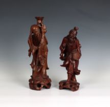 Two Japanese carved wooden figures the tallest 14¼in. (36.2cm.) high. (2)