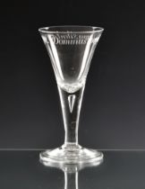 An early Georgian style clear glass goblet with WWI commemorative inscription of drawn trumpet