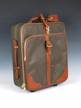 A Mulberry Scotch grain rolling cabin case designed with the maker's brown pebbled scotch grain