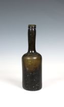 An 18th century cylinder wine bottle olive green, long neck, slightly waisted, tooled rim, kick up