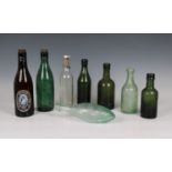A small collection of antique Guernsey bottles to include a Guernsey Aerated Water Co. 1876 glass