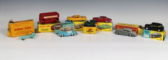 A collection of playworn boxed die-cast cars comprising a Corgi - 303 Mercedes-Benz 300L (broken
