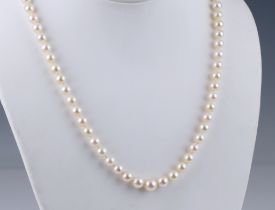 A single strand cultured pearl necklace with 5.75mm .pearls and with 9ct gold and seed pearl