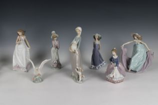 A collection of boxed Lladro figurines to include 866 Girl with puppy and goose; 7636 Girl with