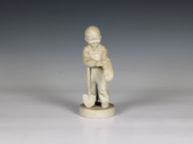 A Parian Ware figure of a young boy putting on a mitten and resting against a spade impressed
