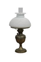 A late 19th century brass oil lamp with white glass shade and clear glass funnel 21in. (53.3cm.)