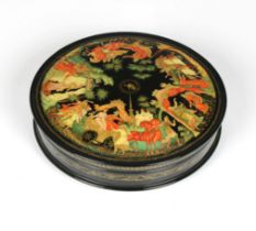 A mid to late 20th century Russian lacquered box of circular form, the pull off cover exquisitely