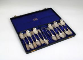 A cased set of twelve silver bright cut fiddle pattern teaspoons and tongs John Round & Son Ltd,