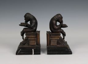 After Bonheur, a pair of patinated bronze figural bookends modelled as monkeys reading upon stacks