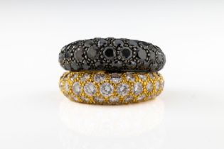 A black and white diamond double bombe ring Of symmetric double bombe form, in 18ct yellow gold,