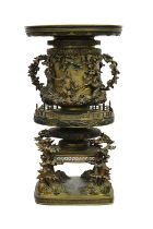 A fine Japanese twin handled bronze vase by Momose Shigesato (Japanese, 19th Century) Meiji