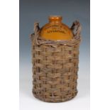A large two gallon Standish & Co Limited Liverpool flagon in basket 17in. (43.2cm.) high. *