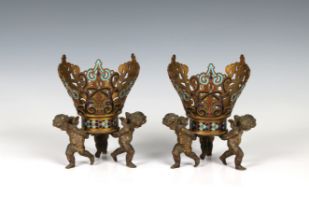 A pair of 19th Century figural vases stamped HN, champlevé, bronze, and gilt metal, the openwork cup