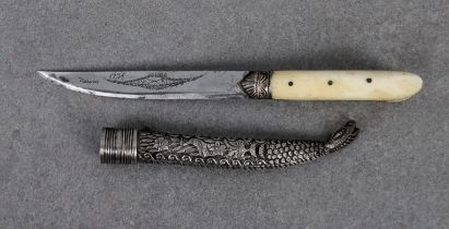 A small Turkish Bichaq type knife 10.8cm. single edged blade, later engraved with foliate design and