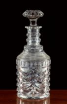 A late Georgian cut glass mallet decanter the triple facetted ring and panel cut neck over a step
