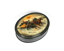 A mid to late 20th century Russian lacquered box of oval form, the hinged cover depicting a troika