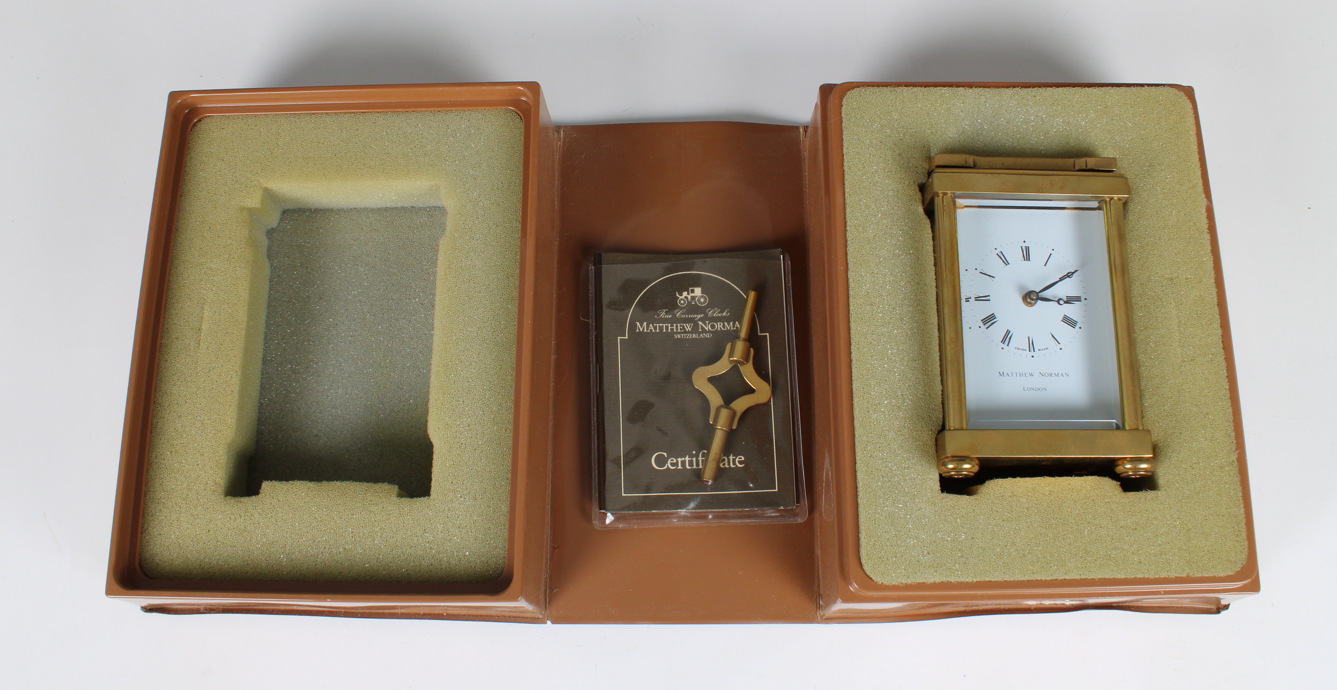 A Matthew Norman carriage clock 20th Century, with visible escapement, white dial with Roman - Image 4 of 5