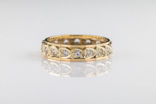 A paste eternity ring In 9ct yellow gold with heart shaped setting, ring size N 1/2