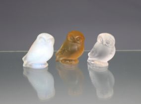 Three Lalique Owl figurines modelled in opalescent, green & frosted, no 11757, each 2¼in. (5.3cm.)