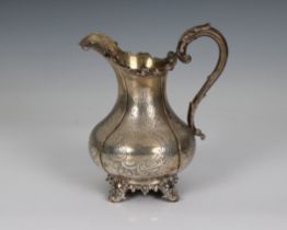 A Victorian silver baluster cream / milk jug Charles Reily & George Storer, London, 1843, of lobed