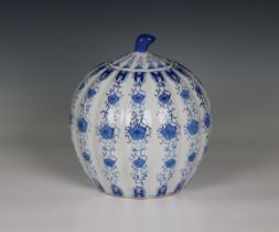 A 20th century Chinese blue and white porcelain pumpkin lidded jar marked "Made in China" beneath,