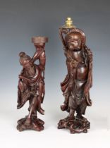 Two early 20th century Japanese carved wooden figures converted to table lamps 19in (48.3cm.) and