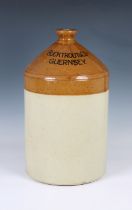 A Bucktrout & Co Limited Guernsey three Gallon flagon by Doulton Lambeth, 17 5/8in. (44.8cm.)