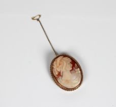 A 9ct yellow gold cameo brooch the shell cameo carved depicting the profile of a lady, in rope twist