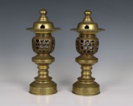 A pair of Japanese style temple lamps / candle lamps having opening pierced galleries for tea