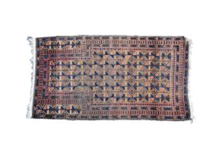 A Turkmen prayer rug with repeating geometric and soldat borders, 59 x 34in. (149 x 87cm.). *