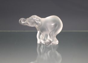 A Lalique Baby Elephant "Timore" no 1179300, 1995, original sticker, etched 'Lalique France', 3 1/