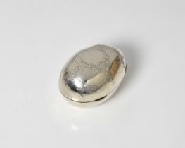 An Edwardian silver egg shaped table / trinket box