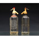 Jersey clear glass soda syphons - two variants by E. Le Dain