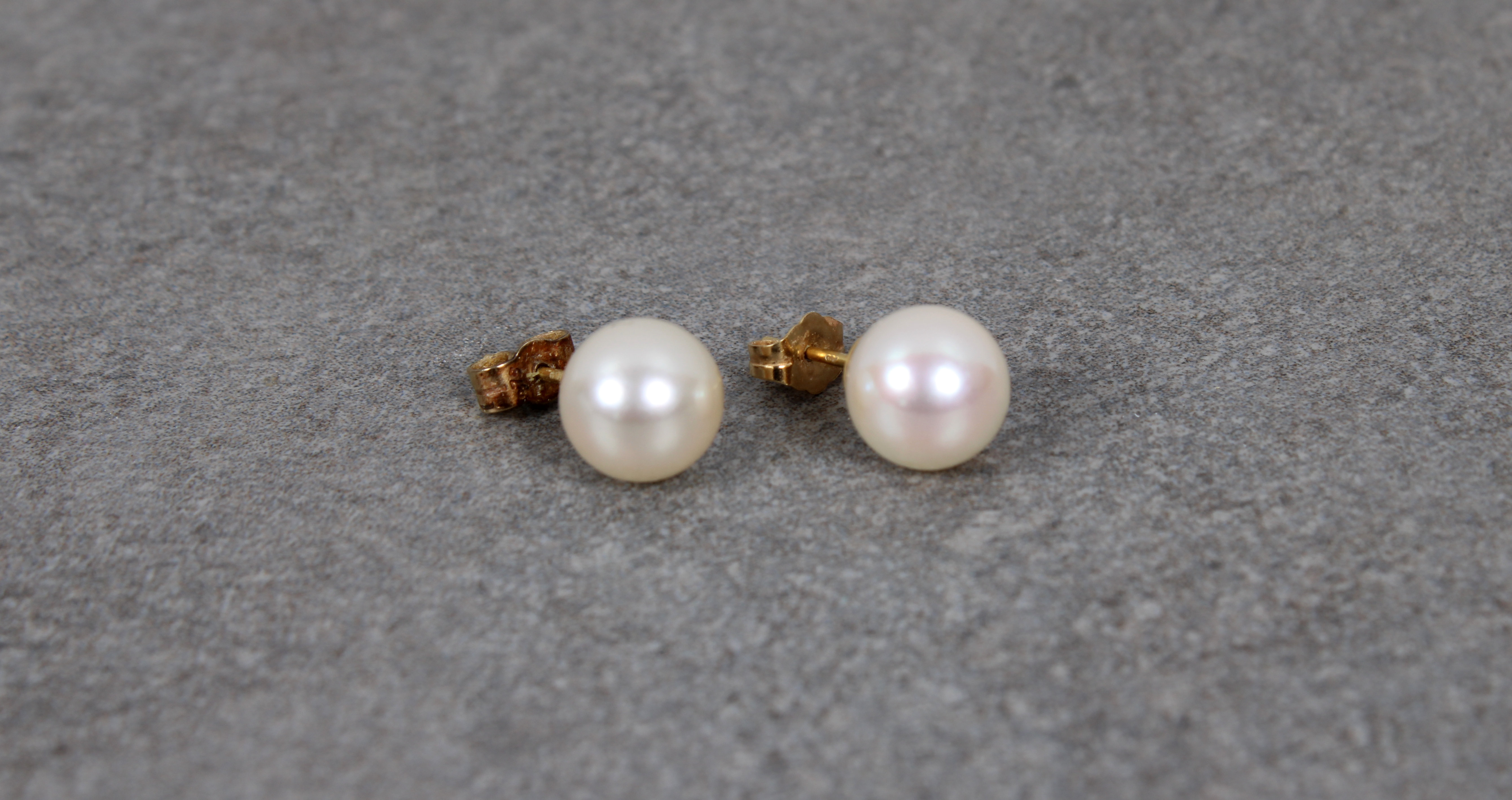A pair of 18ct yellow gold pearl ear studs