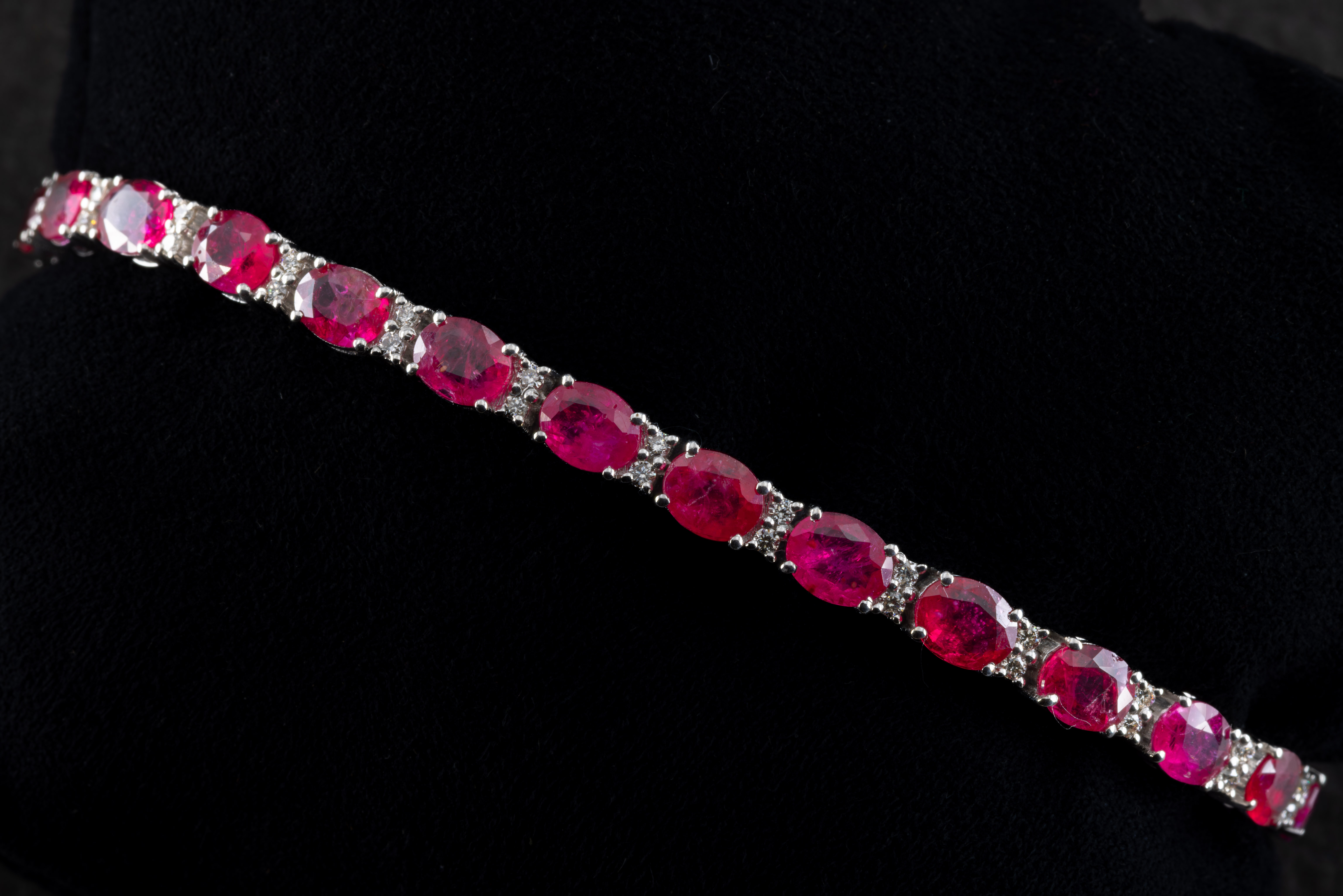 An 18ct white gold ruby and diamond bracelet