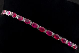 An 18ct white gold ruby and diamond bracelet