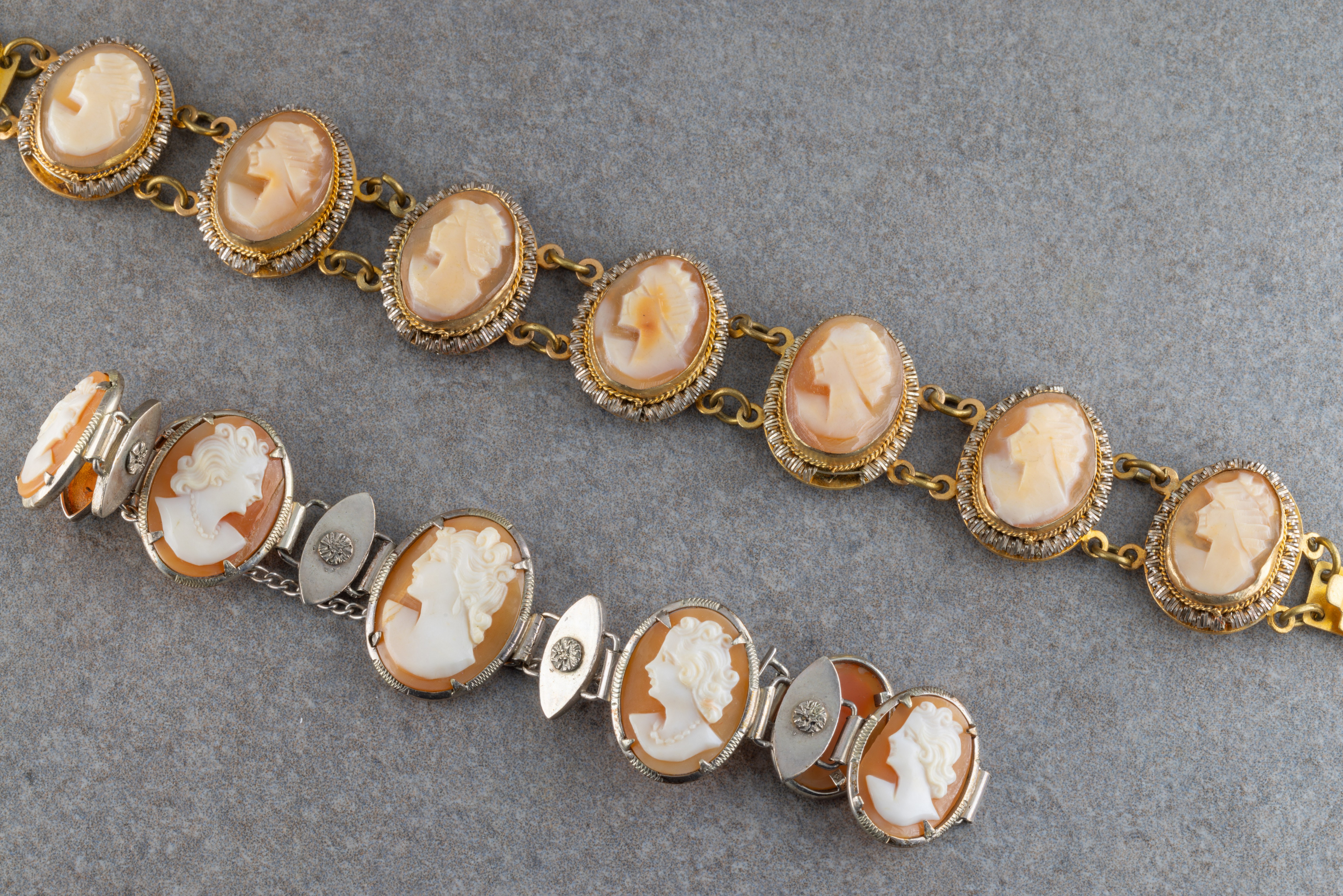 Two continental silver and silver gilt carved shell cameo bracelets