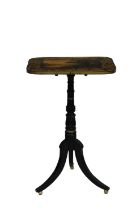 A Regency ebonised tilt-top table