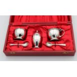 A cased silver cruet set