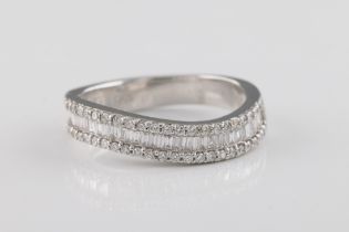 A diamond wavy half eternity ring