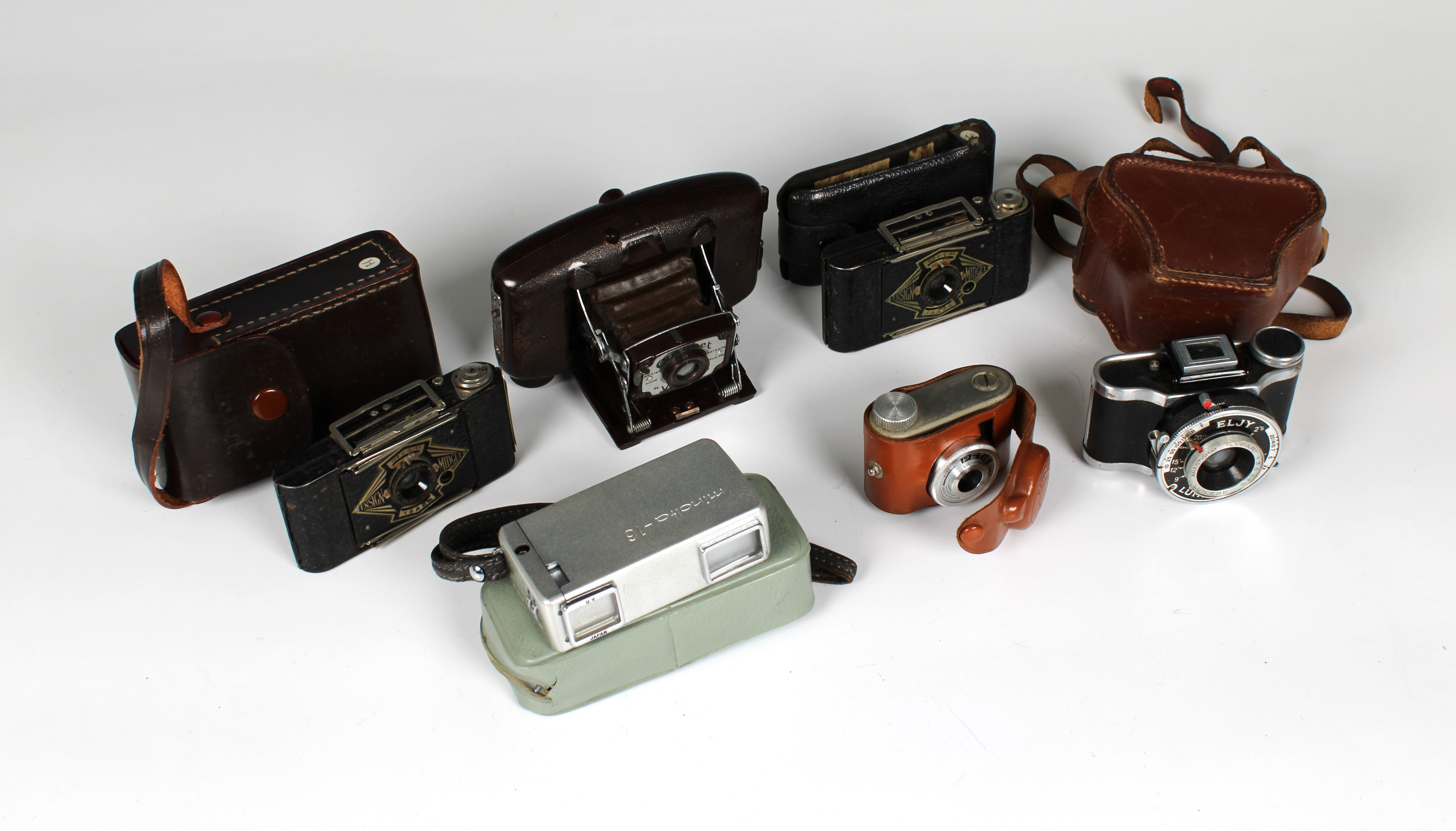 A collection of vintage miniature cameras