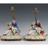 A pair of Capodimonte porcelain table lamps modelled as a courting couple