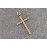 A 9ct yellow gold cross