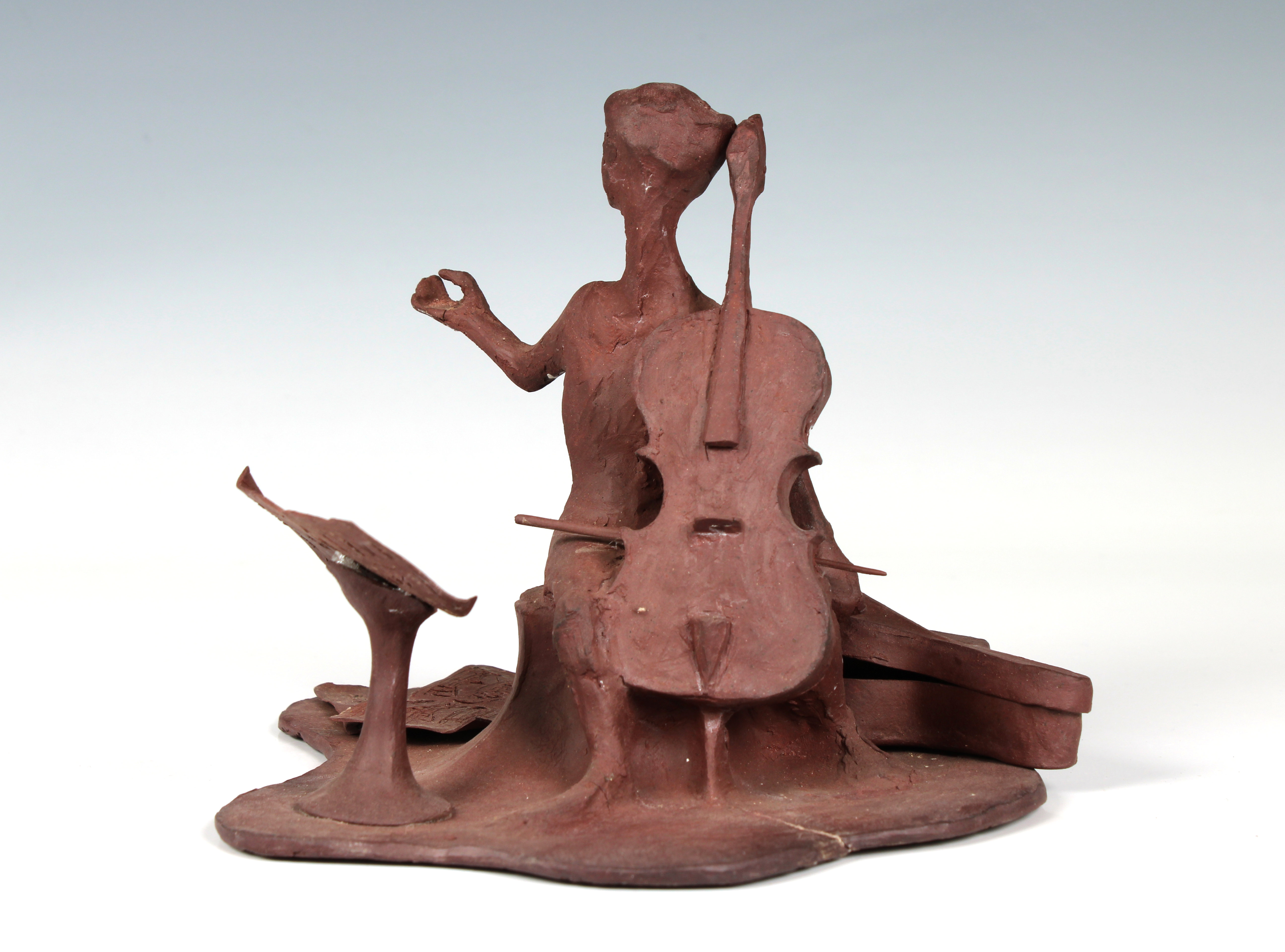 Elizabeth Ann Macphail (1939-89) An unglazed stylised cellist or double bass player sculpture - Image 2 of 6