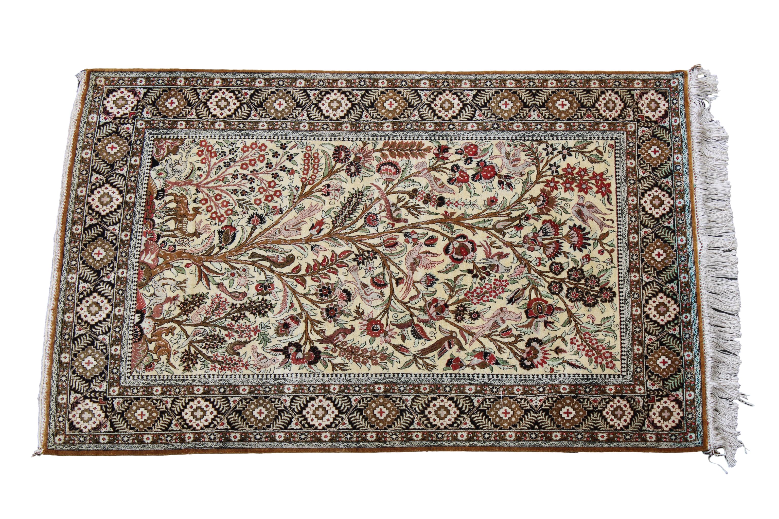 A fine silk Qum Tree of Life rug